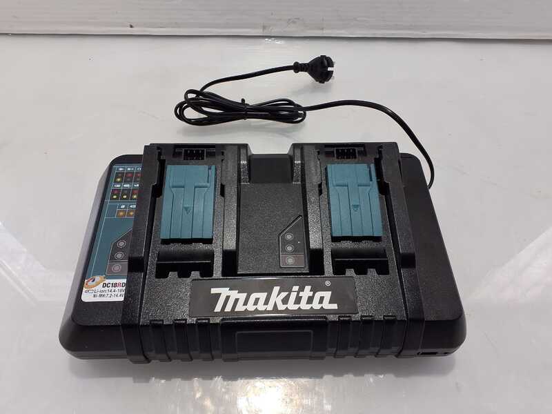 OUTLET - PICCOLI DIFETTI ESTETICI - Caricabatterie doppio Makita DC18RD