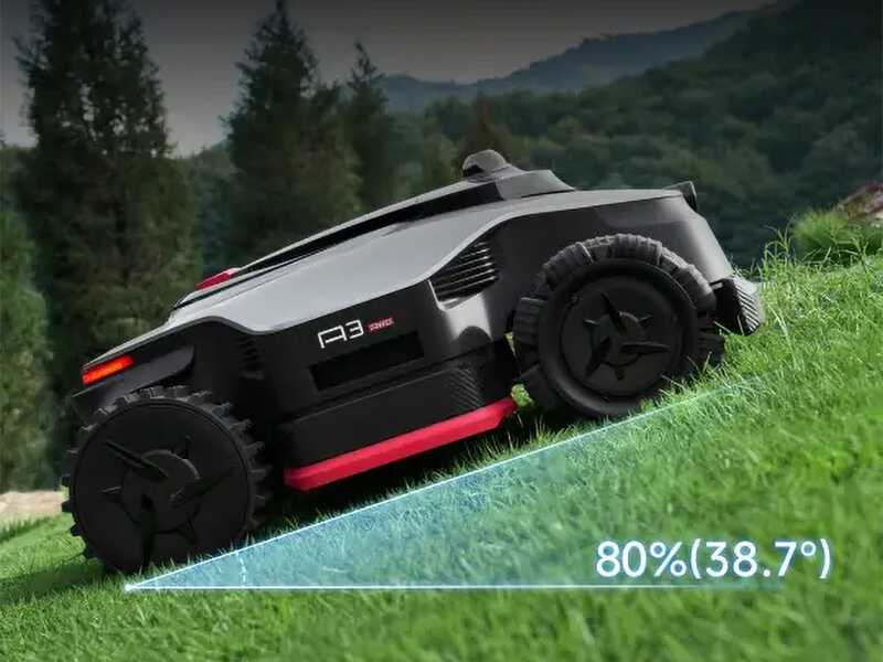 Robottiruohonleikkuri nurmialueen reunalla