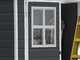 Keter Manor nero - Casetta da giardino - Con finestre frontali - 185x152x226 cm